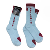Light blue socks with red text and accents on a white background
